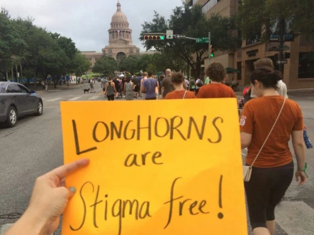 "Longhorns are Stigma Free" sign at NAMIWalks event